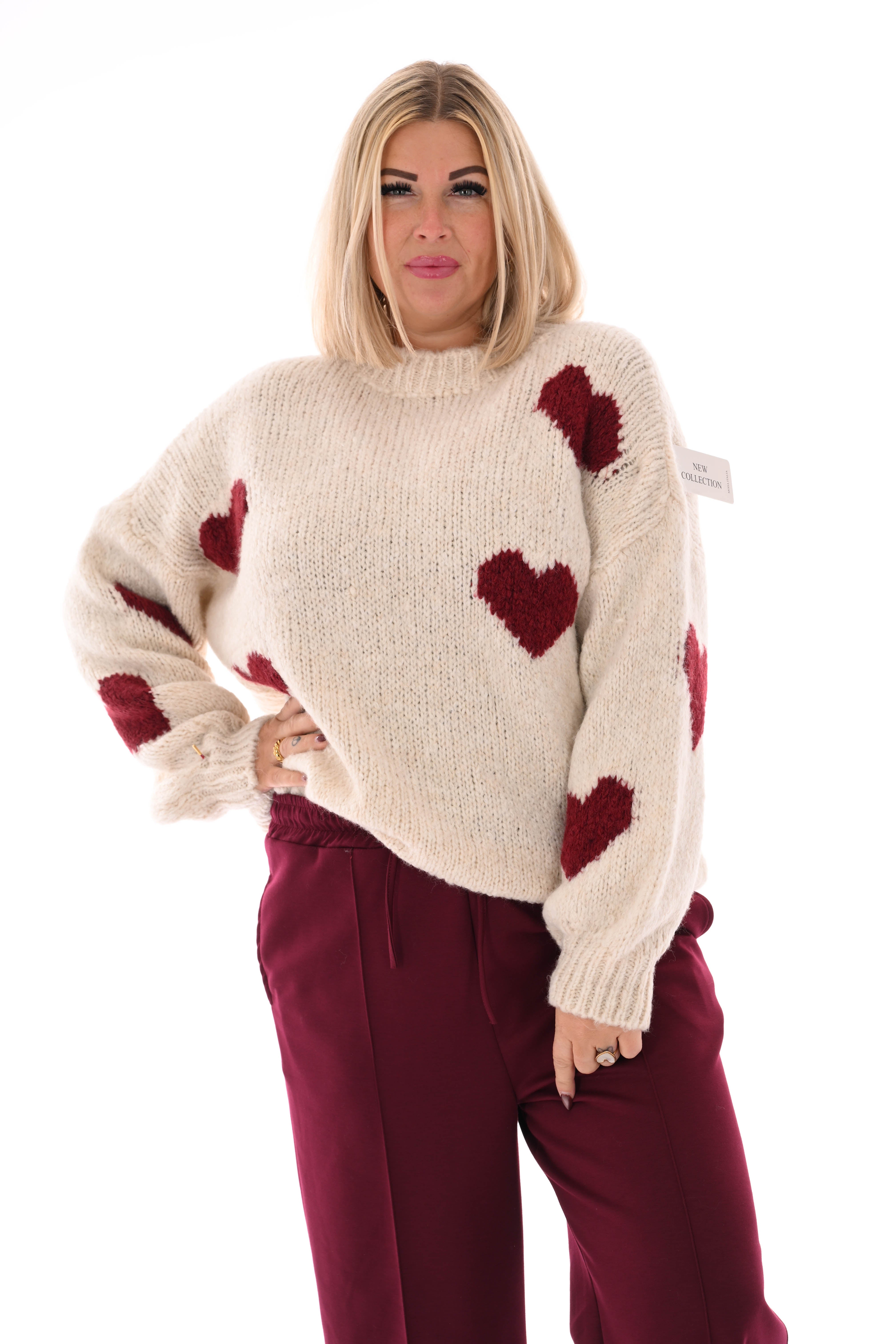 Gebreide trui hartjes roomwit